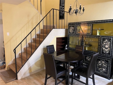 This inviting dining area features a stylish chand