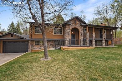 View of front of house featuring a garage, a front