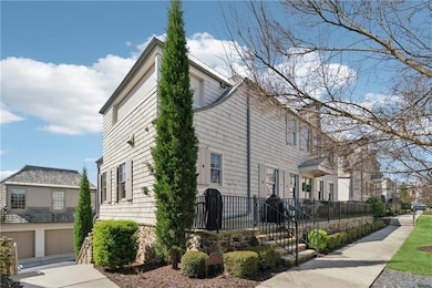 View of home's exterior with driveway, an attached
