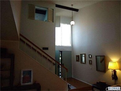 Large entrance and high cathedral living room ceil