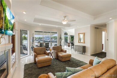 Open living room with wall of windows that walks r