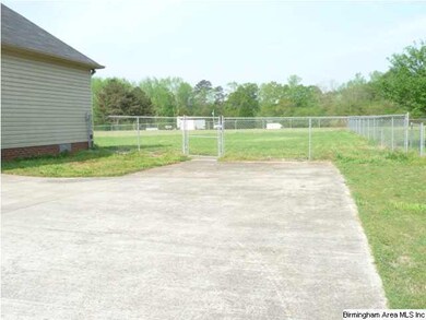 Large level yard with fenced back