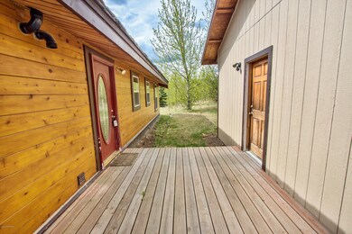 Pass through deck garage & home