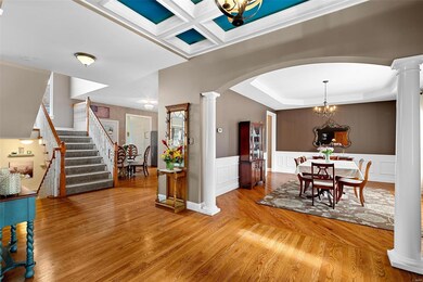 Entry looking into elegant dining room and breakfa