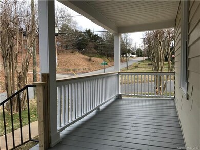 Large corner lot with huge front porch, perfect fo