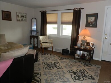 WALK IN TO THIS COZY LIVING ROOM WITH NEUTRAL COLO