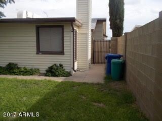 concrete on west side w/gate to front