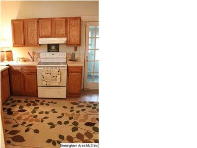 Kitchen has French Door leading to back