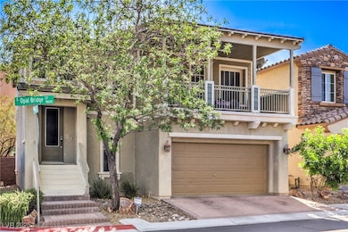 View of front of property with stucco siding, a ba
