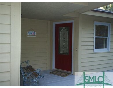 Exterior Front. Welcoming front porch and leaded g