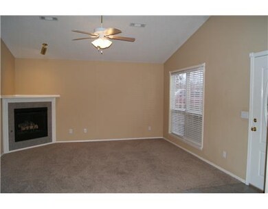 Exterior Front. Vaulted ceilings in living room &