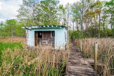 View of outdoor structure with an outbuilding