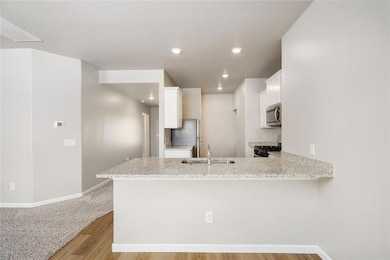 The oversized granite countertops are gorgeous and