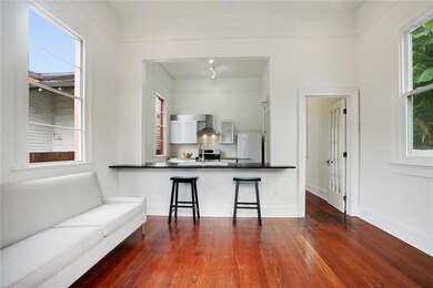 Living room open to kitchen.