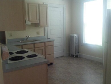 Kitchen. partial view with door to...