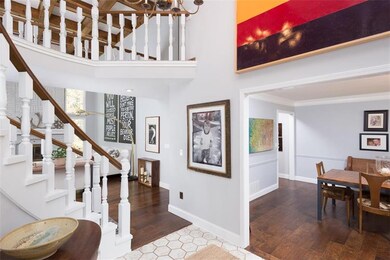 Entry Hall - Hardwoods and spiral staircase - tons