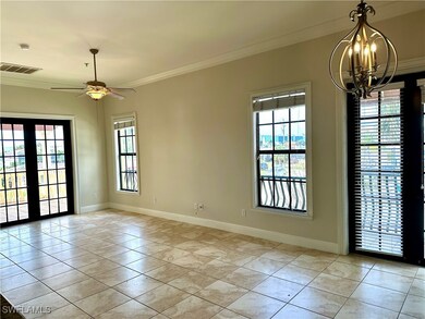 Unfurnished room featuring crown molding, plenty o