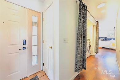 Hall featuring light wood-style floors