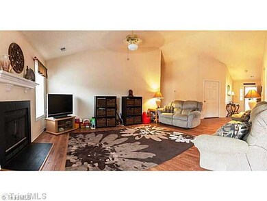 Living Room. Easy to maintain laminate flooring...great for pets and kids!