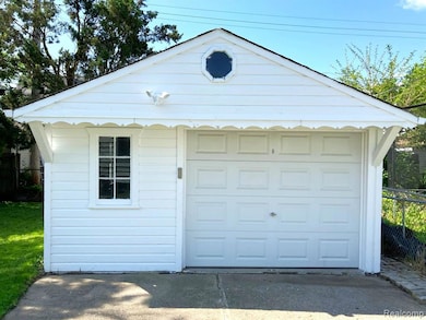 1.5 car garage with electricity and remote door opener.