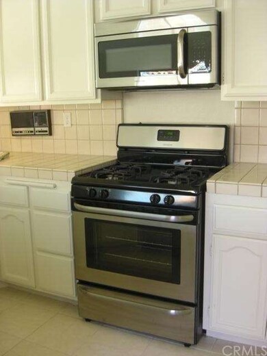 New gas stove and microwave.