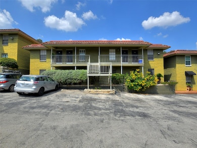 View of building exterior featuring uncovered par