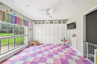 – Large windows, custom built-in storage, making this space great as a playroom, formal dining room, home office, or hobby space.