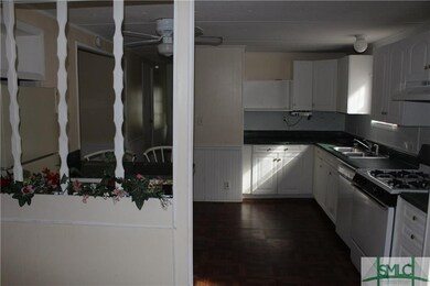 EAT IN KITCHEN BREAKFAST AREA AND WHITE CABINETRY/