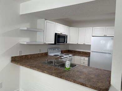 Kitchen featuring appliances with stainless steel 