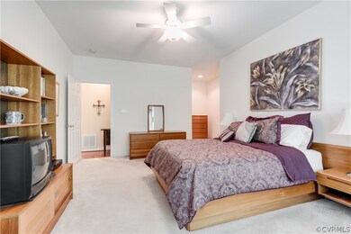 OWNER'S BEDROOM: offers ceiling fan, overhead ligh