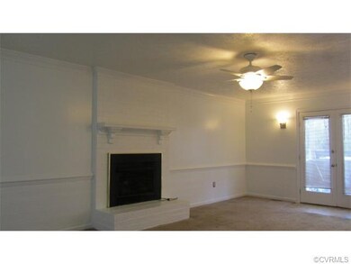 Family Room with Propane Fireplace opens to the Sc
