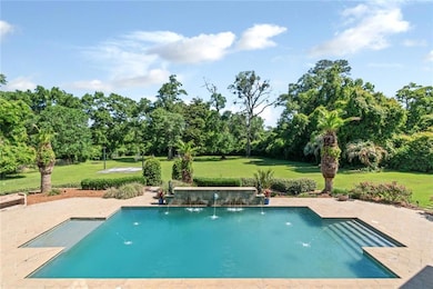 Swimming pool with view of lawn