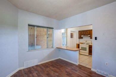 Dining room opens up to the kitchen with breakfast