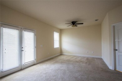 Expansive master bedroom w/french doors that leads