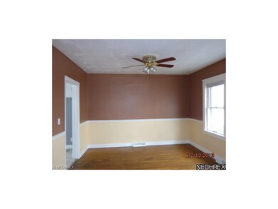 Dining room with hardwood flooring