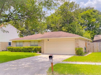 10115 Swirling Winds Dr, Houston, TX 77086 - photo 2