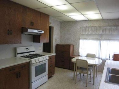 Spacious Kitchen with lots of custom ash cabinets 