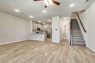 View of Kitchen and stairs