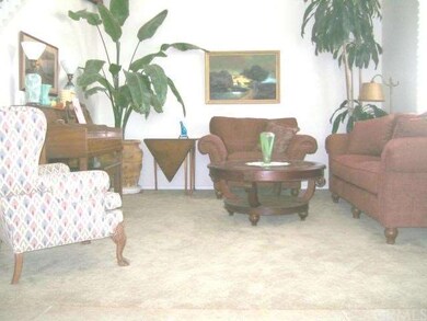 View of Formal Living Room with Vaulted Ceilings i