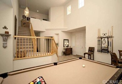 Living Room View towards Entry and Second Floor