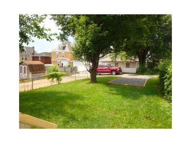 Yard/Garden. Level rear yard with shady gravel par