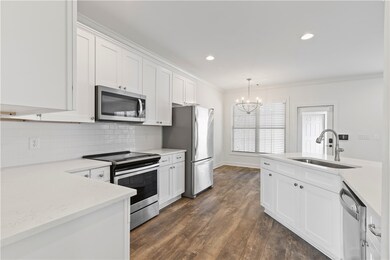 spacious kitchen with beautiful quartz countertops
