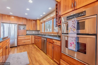 Kitchen features double ovens and scenic views rig