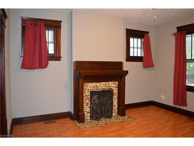 Beautiful Fireplace in Living Room.  Original Wood