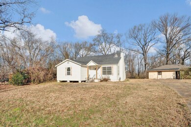 View of front of property with a front yard