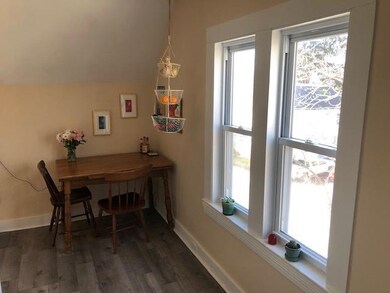 Opposite view, windows looking out onto East Conco