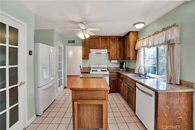 Adorable kitchen with dual pantries