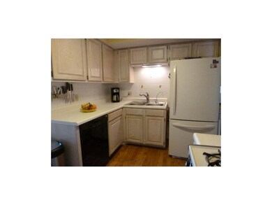 Kitchen has Pergo laminate flooring and good count