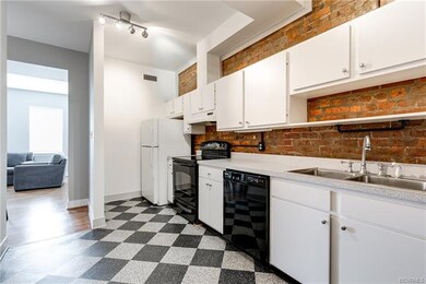 Additional view of the kitchen through to the livi