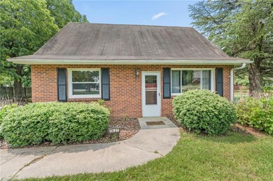 This darling All Brick home oozes character!